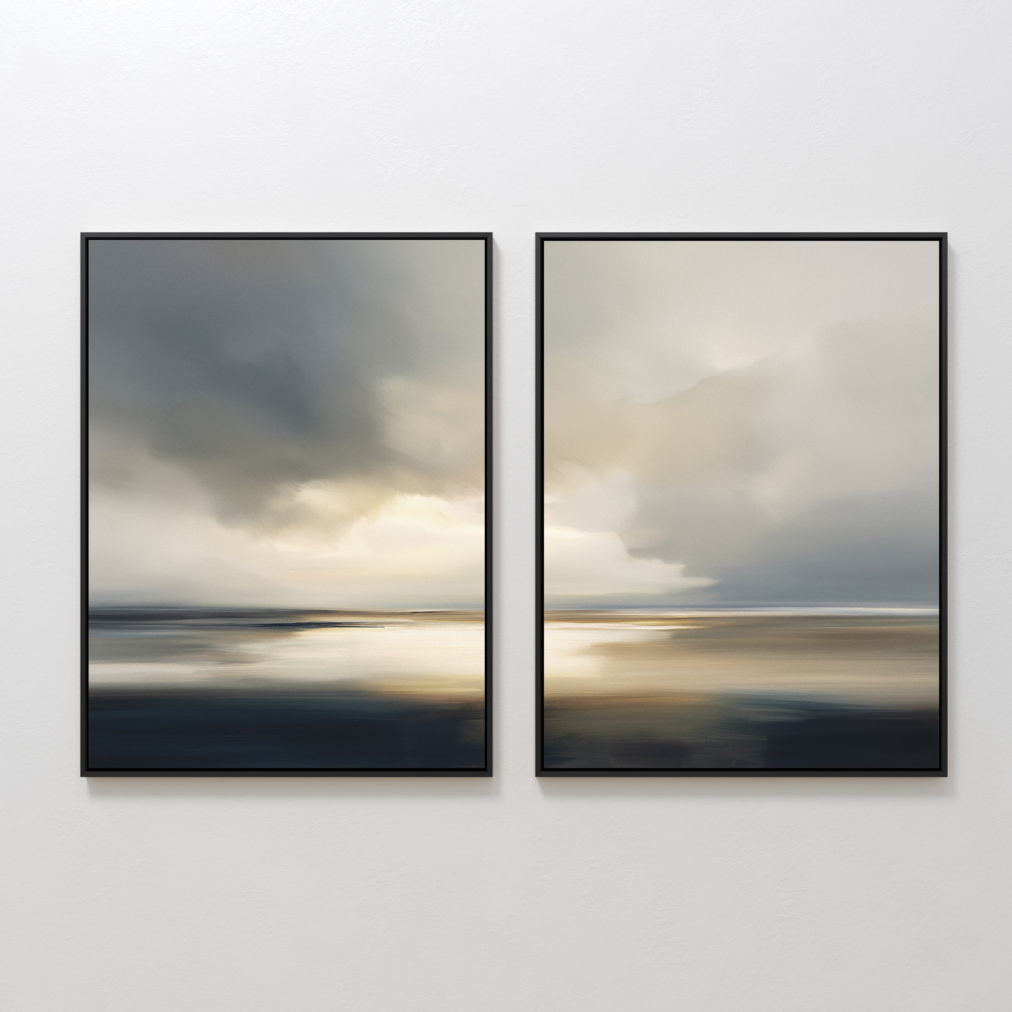 Stormy Tides - Set of 2 features framed abstract wall art shown side by side on a white wall, with blurred seascapes of stormy gray clouds and sunlight glinting off calm, dark blue water.