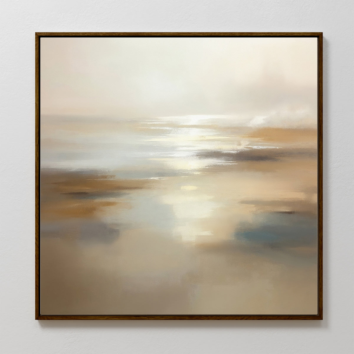 The Sunlit Waters Canvas Art - Square is a framed abstract painting that captures a serene beach scene with soft beige and cream tones, reflecting light over water and sand beneath a hazy sky.