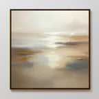 The Sunlit Waters Canvas Art - Square is a framed abstract painting that captures a serene beach scene with soft beige and cream tones, reflecting light over water and sand beneath a hazy sky.