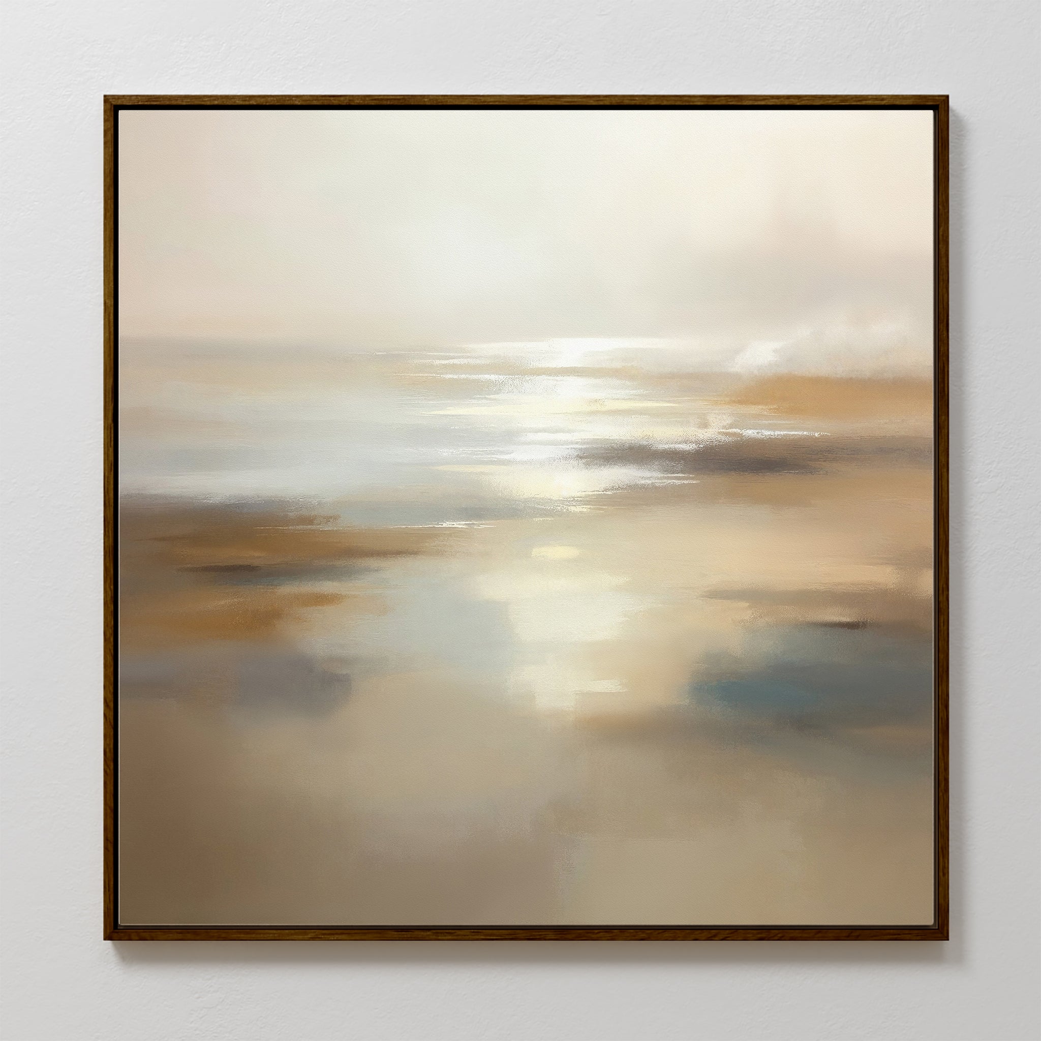 The Sunlit Waters Canvas Art - Square is a framed abstract painting that captures a serene beach scene with soft beige and cream tones, reflecting light over water and sand beneath a hazy sky.