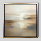 The Sunlit Waters Canvas Art - Square is a framed abstract painting featuring soft beige, blue, and white tones that evoke the tranquility of sunlight reflecting on calm waters and sandy shores.