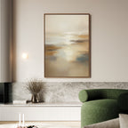 A modern living room with a green armchair, a marble bench, a vase with dried branches, and Sunlit Waters Canvas Art - Vertical—an abstract print in neutral tones—hanging on a beige wall.