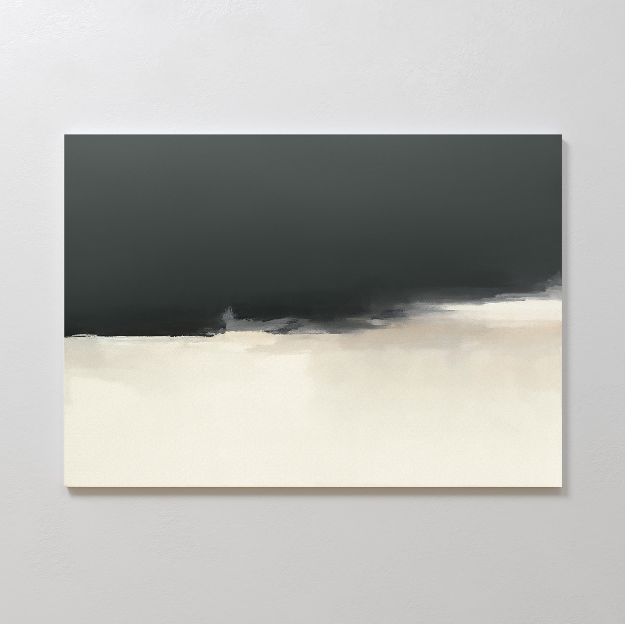The Tempest Brewing Canvas Art - Horizontal features a broad dark gray band at the top, blending into off-white and beige below for a soft, minimalist look. Displayed here on a light-colored wall.