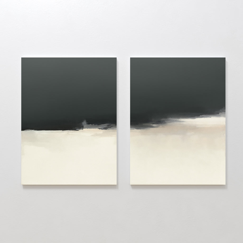 The Tempest Brewing - Set Of 2 features two abstract square paintings with dark gray tops fading into light beige and off-white. Displayed side by side on a white wall, they create modern, minimalist, and dramatic wall art.