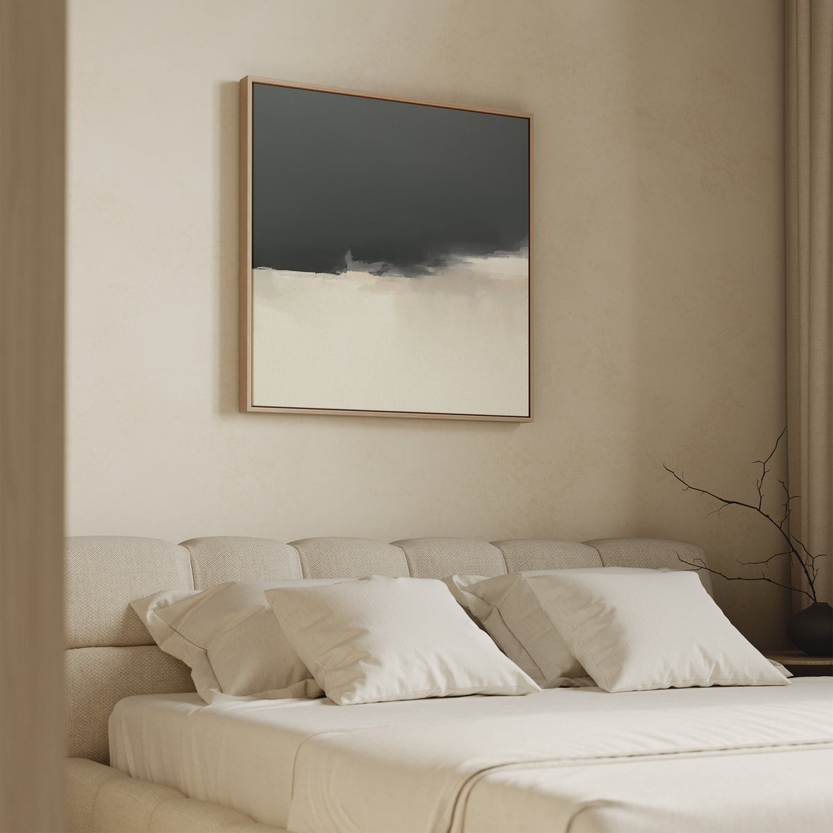 A minimal bedroom with a beige upholstered bed, white bedding, and light walls features the Tempest Brewing Canvas Art - Square in dramatic tones above the bed. A bare branch sits on a side table near beige curtains.