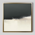 Tempest Brewing Canvas Art - Square features abstract atmospheric wall art in a gold frame, with a dark charcoal upper half blending softly into a light off-white lower half and subtle tonal transitions.