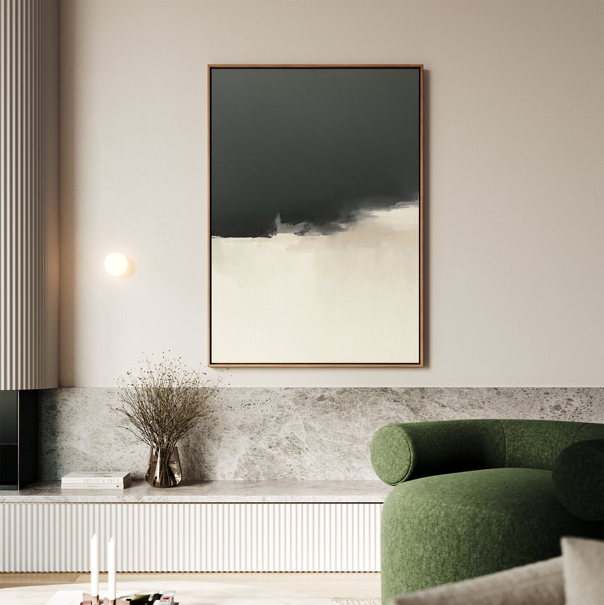 A modern living room with a green curved sofa, marble bench, dried flowers, and a round wall light features the Tempest Brewing Canvas Art - Vertical in dramatic tones—a striking touch inspired by Nordic Park aesthetics.