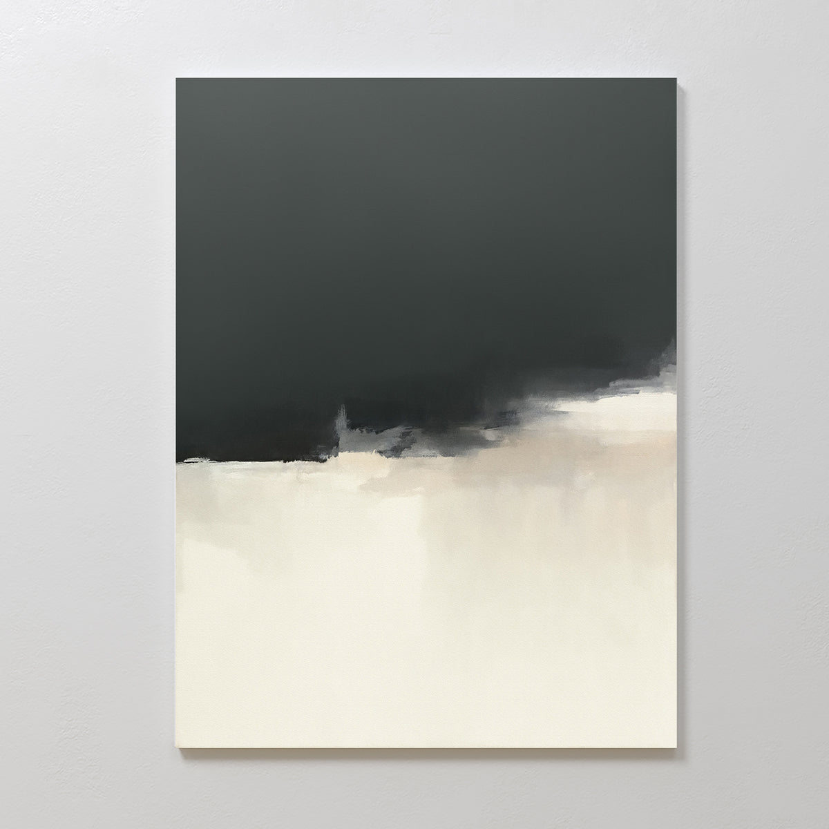 The Tempest Brewing Canvas Art - Vertical features a dark gray top fading into an off-white lower half, creating a serene, Nordic-inspired abstract. Mounted on a white wall, it brings tranquil, atmospheric elegance to any room.