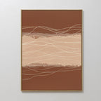 Terracotta Currents Canvas Art - Vertical features abstract wavy lines in beige, cream, and brown, framed in thin gold against a light gray wall. This contemporary print suggests movement—ideal for lovers of terracotta-inspired wall art.