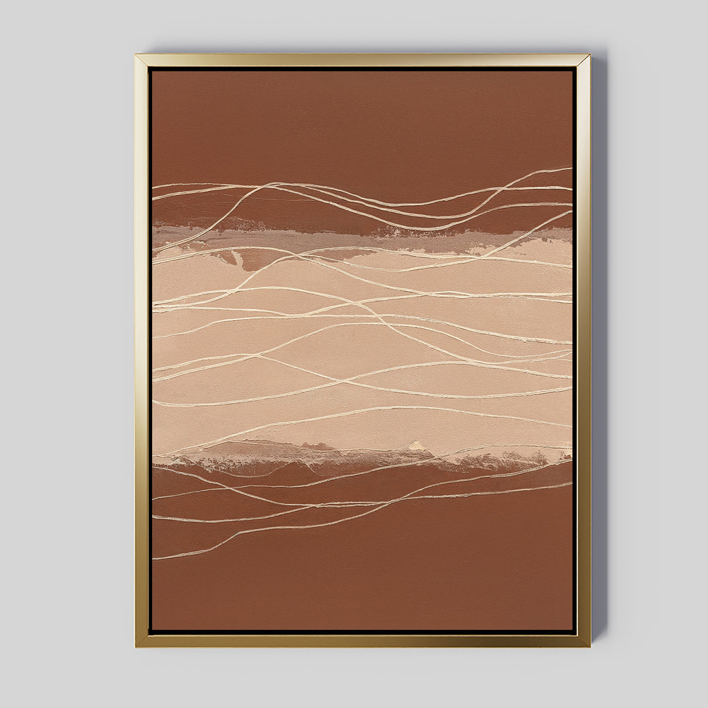 The Terracotta Currents Canvas Art - Vertical features wavy cream and beige lines on a brown background, resembling a landscape. Displayed in a gold frame, it creates a stylish contemporary statement on any light gray wall.