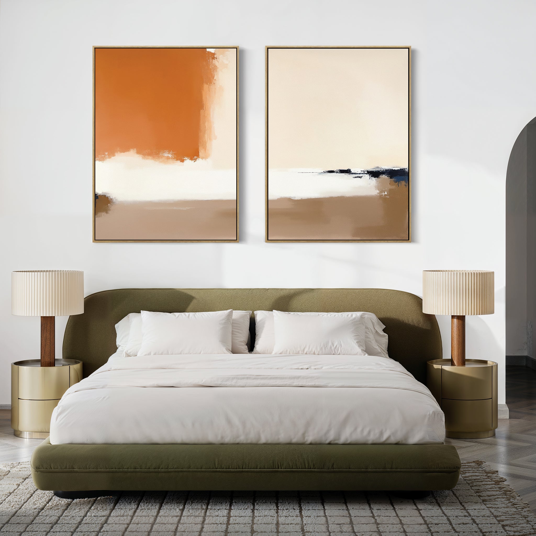 A modern bedroom with a green upholstered bed, white bedding, gold nightstands and lamps, and Terracotta Edge - Set Of 2 contemporary abstract prints in burnt orange hanging above the bed.