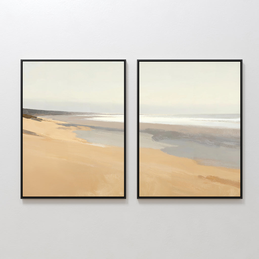 Tidal Meditation - Set of 2: Minimalist framed beach prints featuring smooth sand, gentle waves, and a pale sky in soft muted tones. Display side by side for serene, tranquil decor on any white wall.