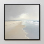 The Tidal Reflections Canvas Art - Square features a serene coastal beach scene with gentle waves, cloudy sky, and faint footprints—ideal as calming wall decor.