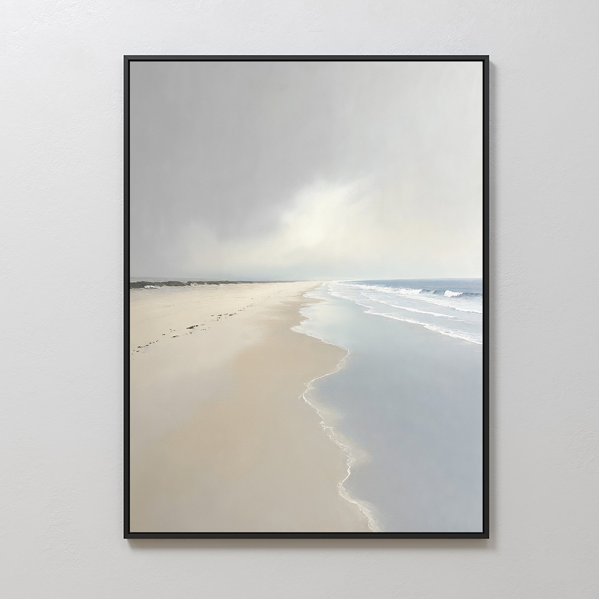 Tidal Reflections Canvas Art - Vertical: A framed coastal canvas featuring a calm, empty beach with gentle waves, a cloudy sky, and shoreline footprints—ideal as calming wall decor for any space.