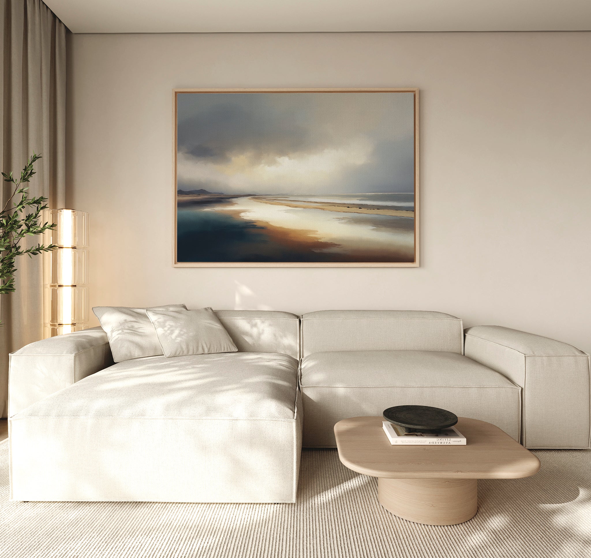 A modern living room with a light beige sectional sofa, a low wooden coffee table featuring a black bowl, a tall plant, and Tidal Reverie Canvas Art - Horizontal as coastal wall art above the sofa. Neutral tones create a calm atmosphere.