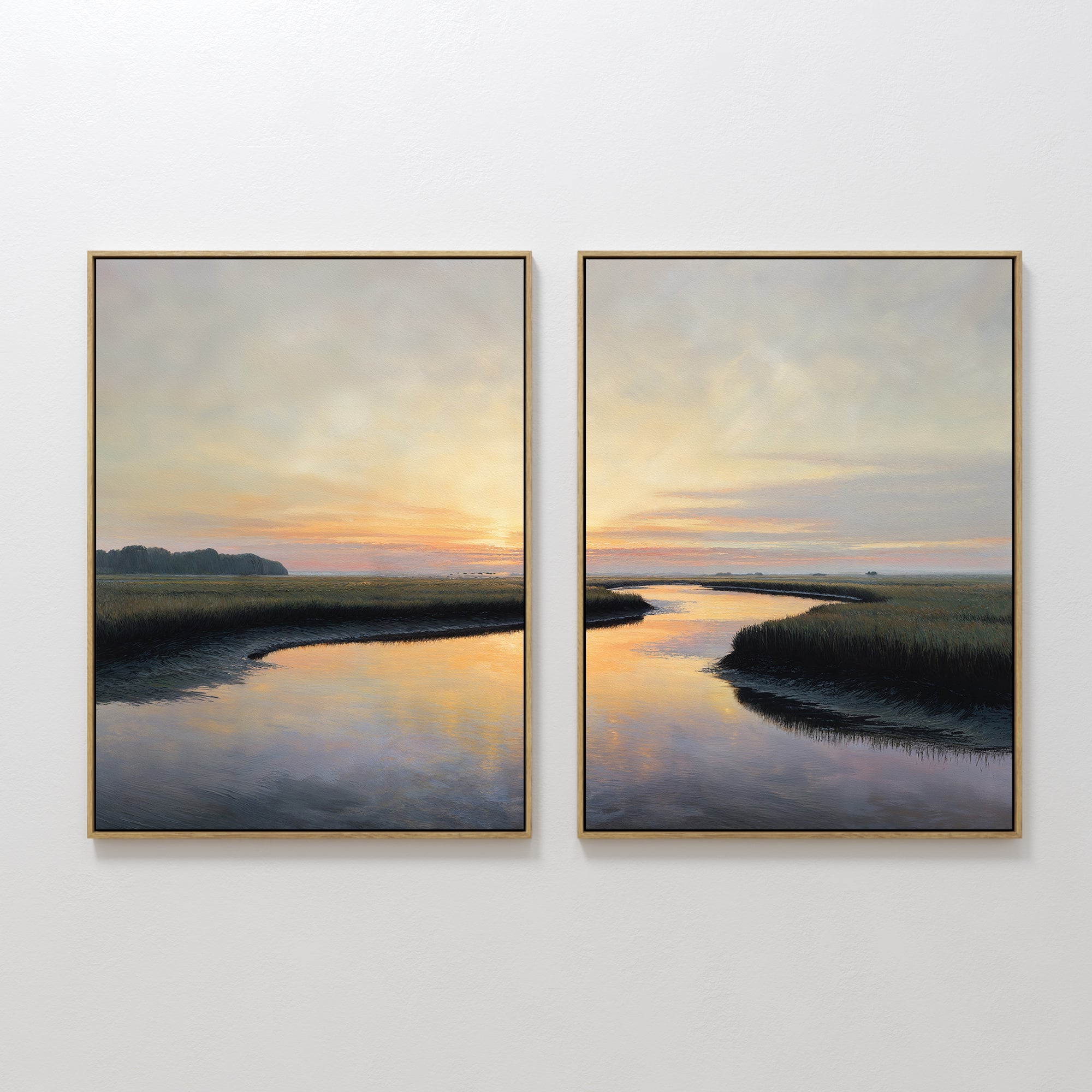 Tidal Whispers - Set of 2 features two framed landscape paintings showing a serene river winding through grassy marshland at sunset, with pastel skies reflected in calm waters—a tranquil coastal marsh wall art set.