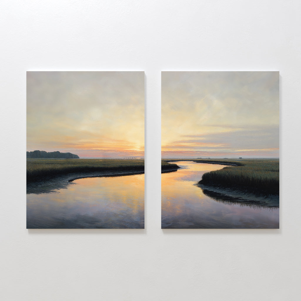 Tidal Whispers - Set of 2 features a serene marsh at sunset on canvas. Soft orange and blue skies reflect in winding water among tall grasses, with distant trees silhouetted for stunning coastal wall art.