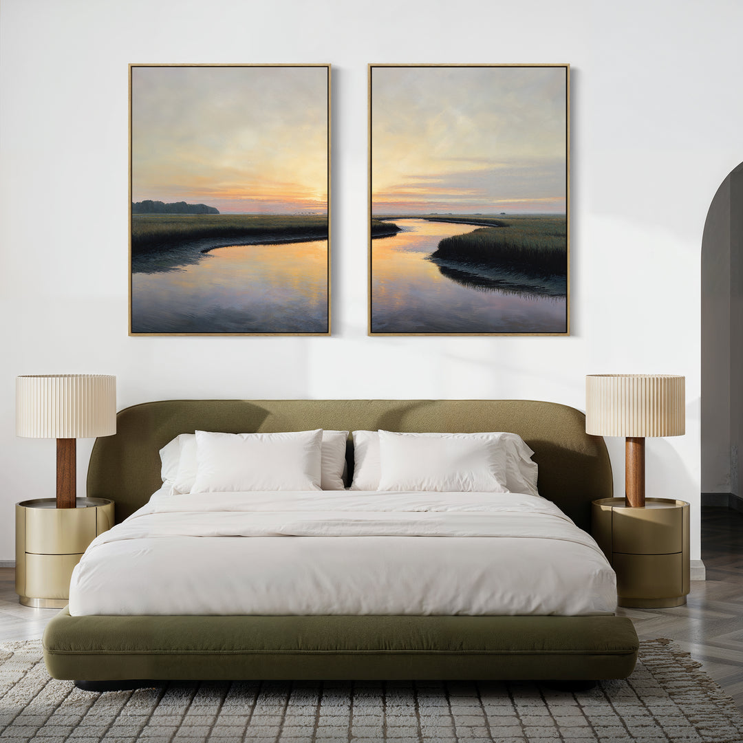 A modern bedroom with a green upholstered bed, beige bedding, two round nightstands with lamps, and "Tidal Whispers - Set of 2" large sunset river canvas prints displayed above the bed.