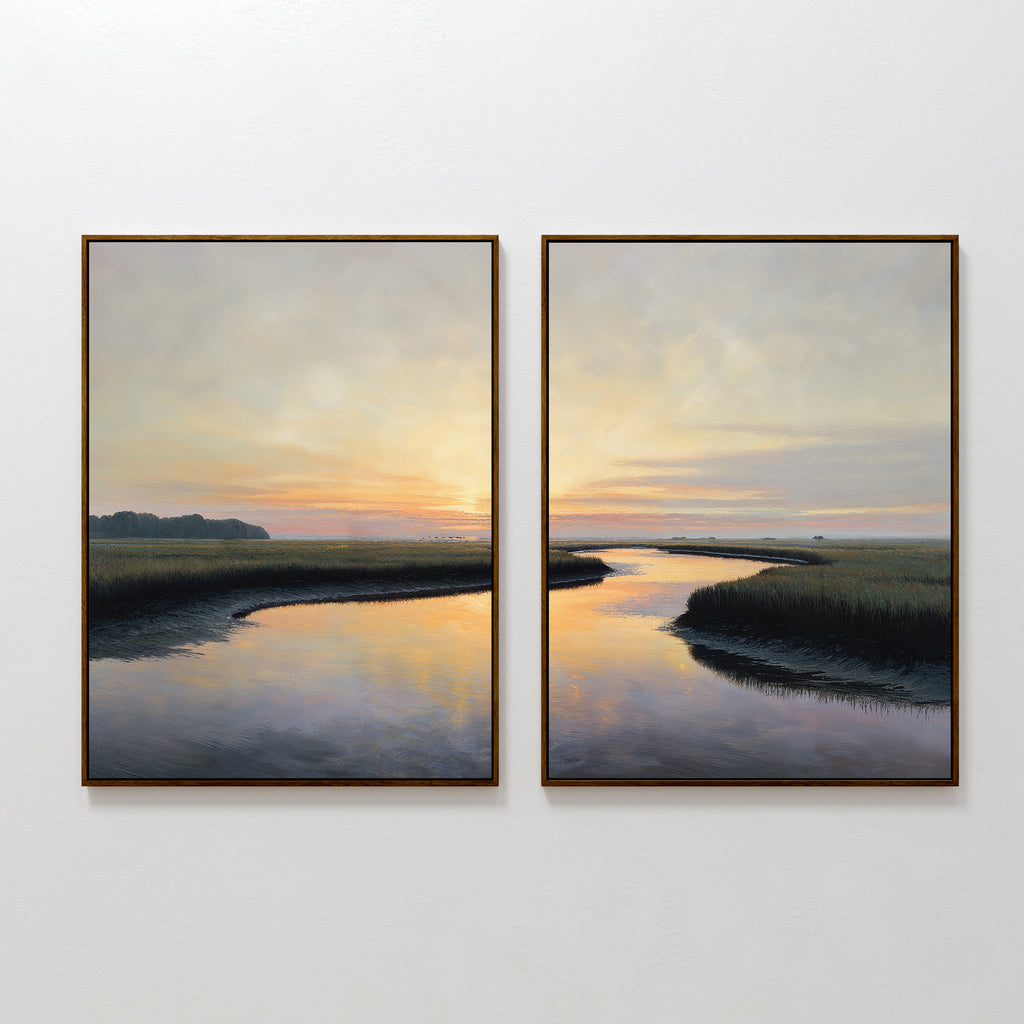 Tidal Whispers - Set of 2 features framed landscape art with tranquil rivers winding through grassy marshes at sunset, soft clouds, and warm pastel colors reflected on the water—perfect coastal marsh wall decor.