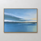 The Tranquil Reflections Canvas Art - Horizontal, featuring a serene blue lake with distant landforms and gentle yellow hues, is ideal as peaceful wall art or calming bedroom decor, displayed here on a plain white wall.