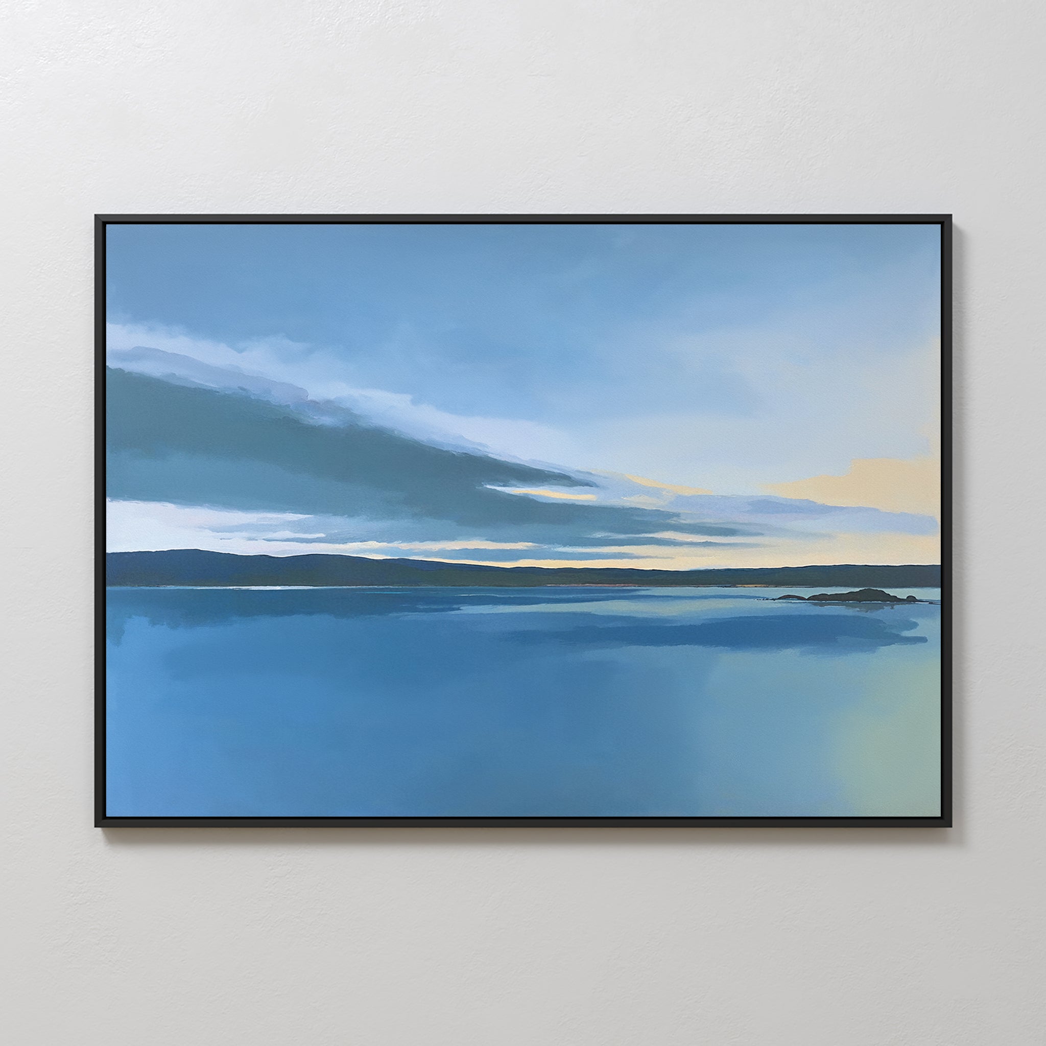 The Tranquil Reflections Canvas Art - Horizontal features a calm blue lake, soft clouds, and a pale sky—ideal for creating a serene atmosphere as calming bedroom decor on any light-colored wall.