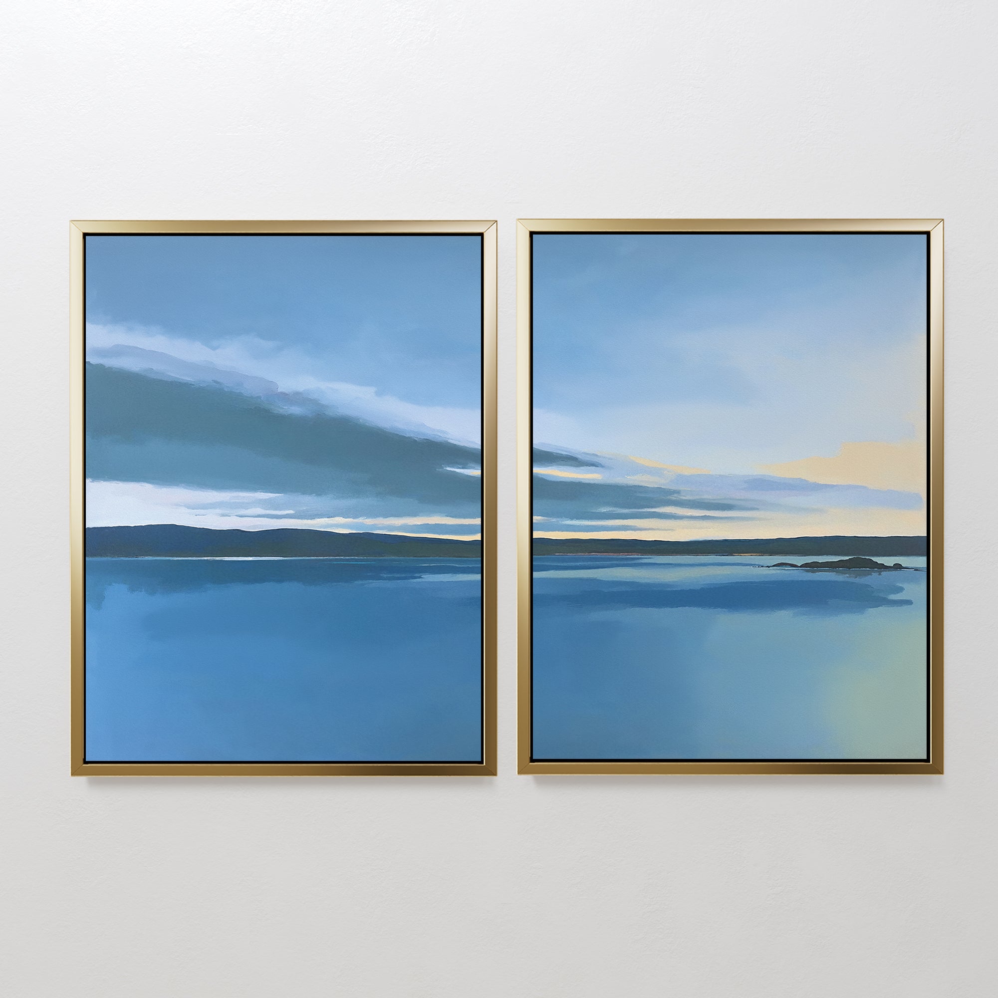 The Tranquil Reflections - Set of 2 features framed paintings of a serene blue lake, distant land, and subtle clouds with yellow accents, bringing peaceful ambiance and elegance to any space.