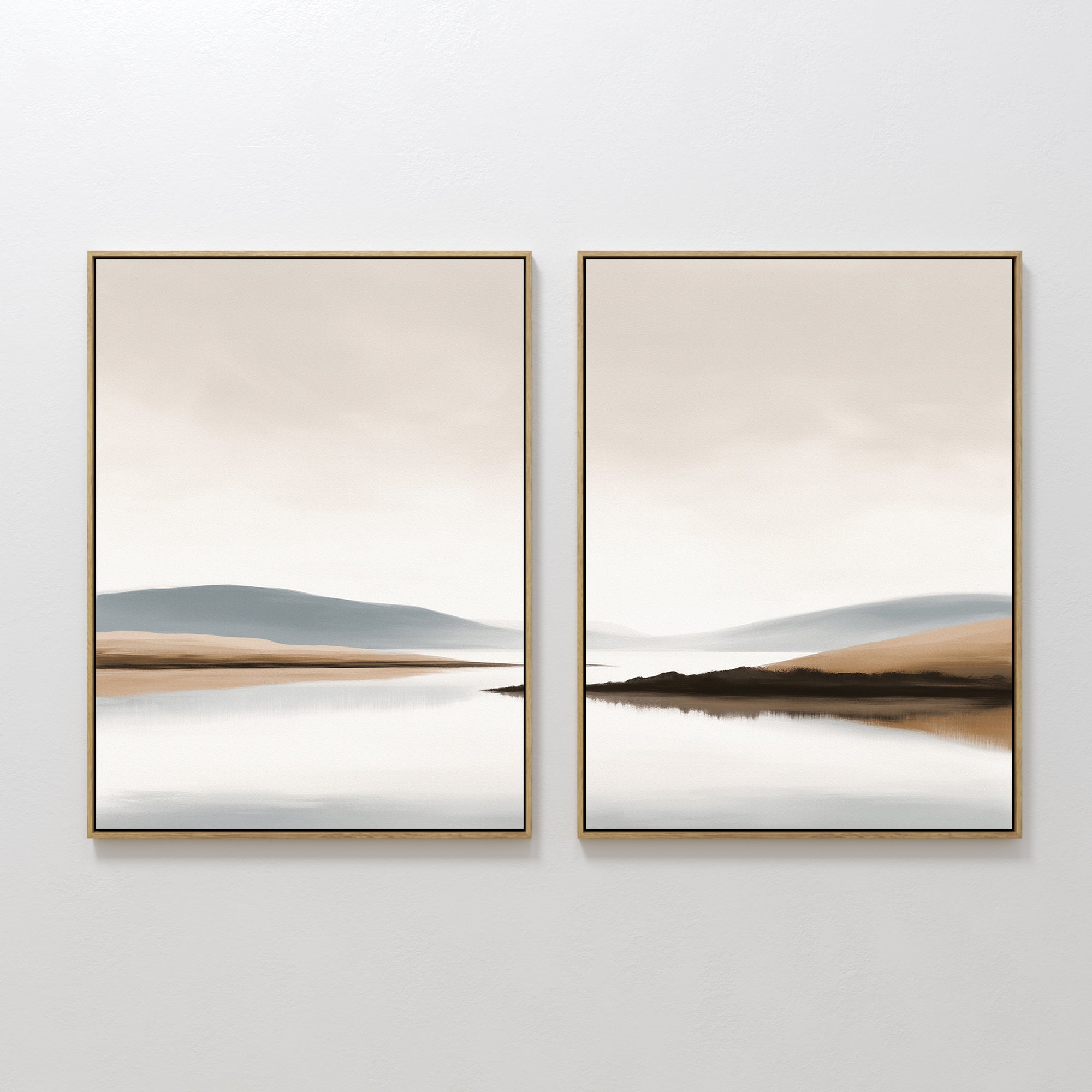 Tranquil Waters - Set of 2: Minimalist misty lakeside paintings in gold frames, featuring beige, blue, and gray tones. Calm water and distant hills beneath a peaceful sky—ideal serene wall art for modern spaces.