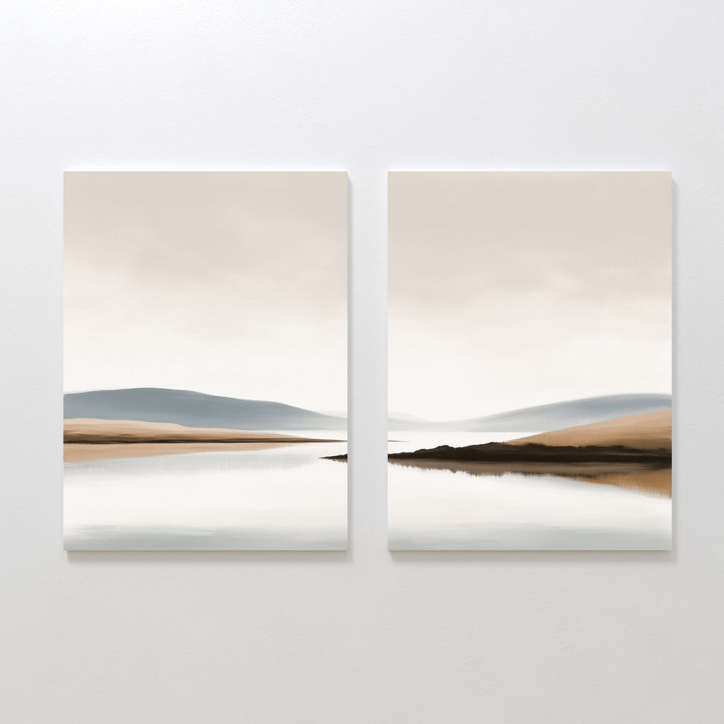 Tranquil Waters - Set of 2 features minimalist lakeside landscapes in beige, blue, and gray, with calm water and muted hills reflecting a cloudy sky—perfect serene wall art to create a peaceful atmosphere in any space.