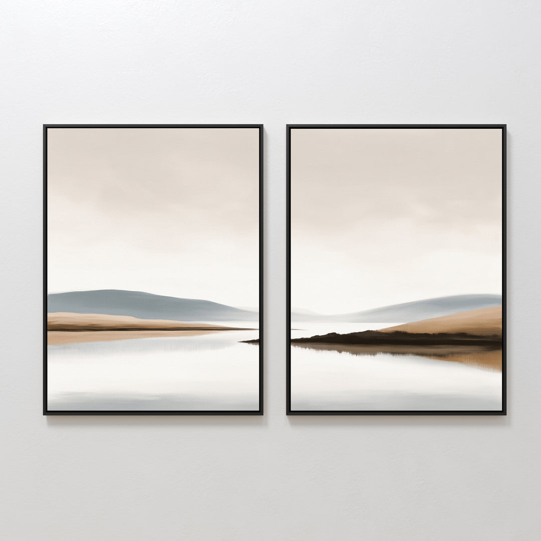 Tranquil Waters - Set of 2 features framed minimalist lakeside landscape prints with calm water, distant hills, and a neutral sky. These serene wall art pieces create a seamless, peaceful scene when displayed side by side.