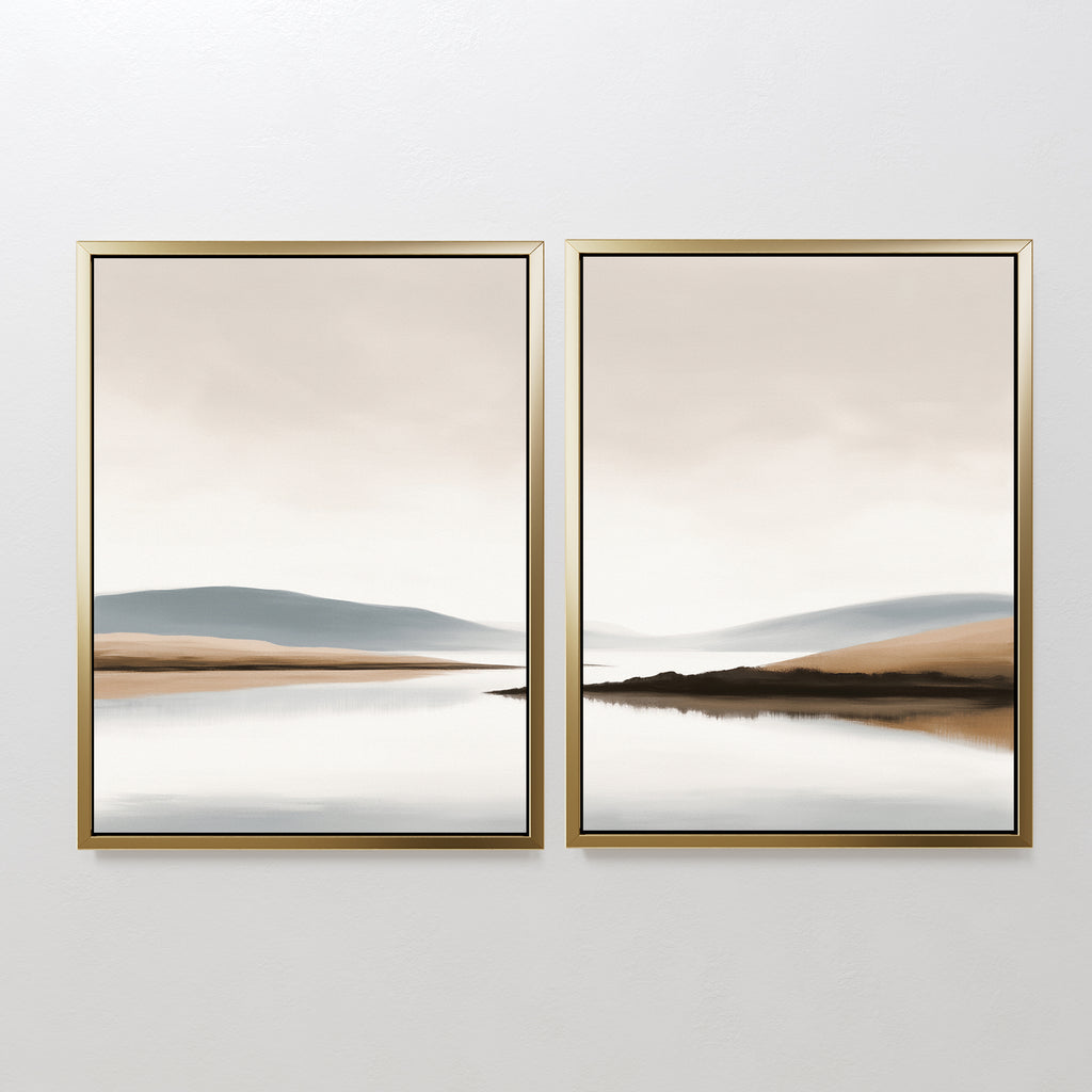 The Tranquil Waters - Set of 2 features framed wall art with minimalist lakeside landscapes in beige and blue. These canvas prints depict calm water and distant hills, creating a serene, mirrored effect when hung side by side.