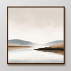 Enhance your living room decor with the Tranquil Waters Canvas Art - Square, featuring a serene lakeside scene in beige, blue, and gray tones—misty hills and a calm reflection framed for elegance on any white wall.