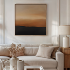 A neutral-toned living room with a beige sofa, light cushions, a dried floral arrangement in a striped vase, and the Tranquil Vista Abstract Canvas Art—ideal for those who love refined decor in warm brown and orange gradients.