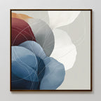 Translucent Petals Canvas Art - Square features abstract overlapping shapes in blue, white, and burgundy with delicate white curved lines. This contemporary piece comes framed in a simple, dark wooden frame.