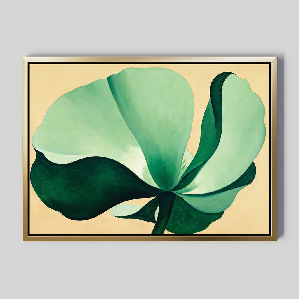 Tropical Serenity Canvas Art - Horizontal: A framed abstract green flower with large petals on a light beige background, ideal as neutral wall decor, displayed on a plain gray wall.