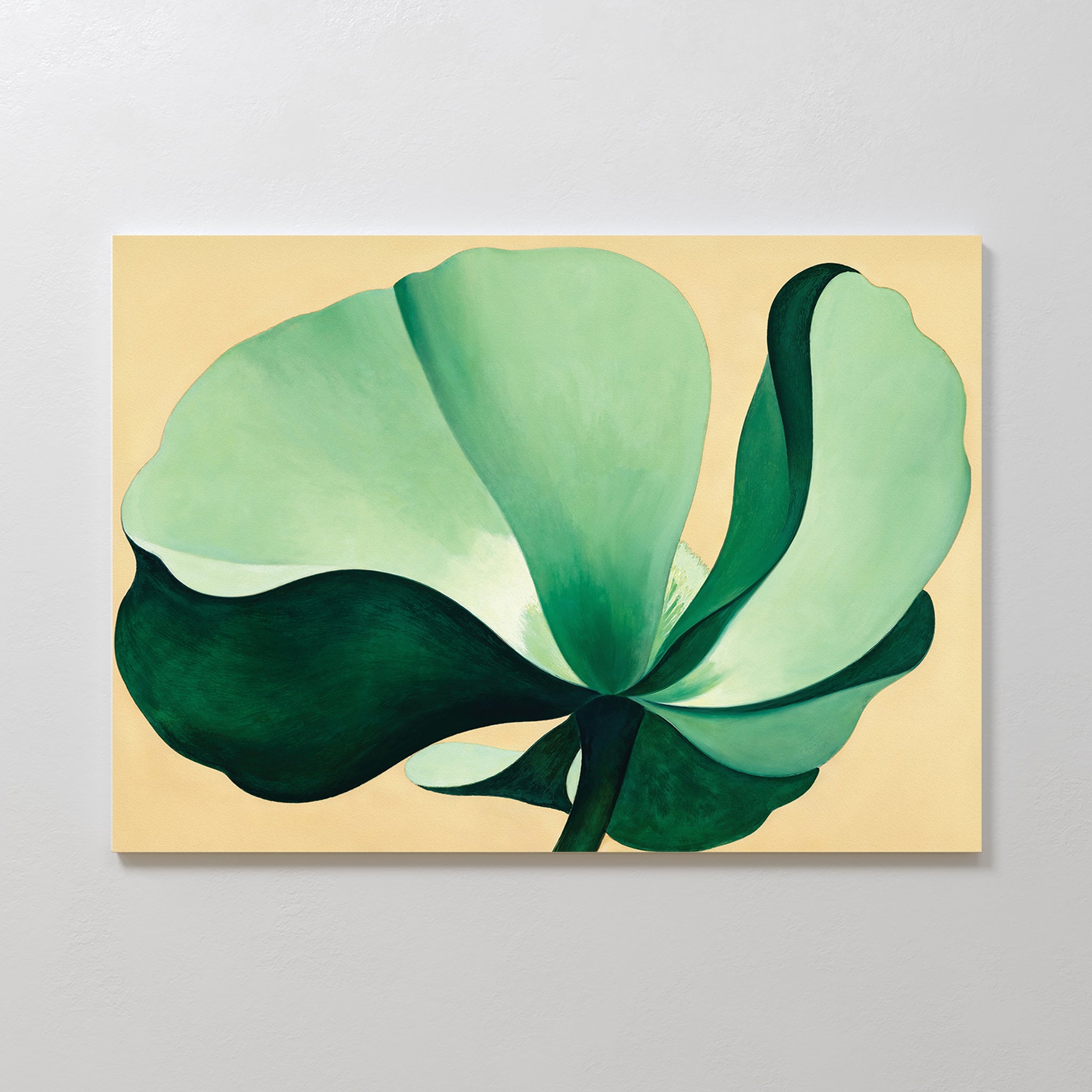 Tropical Serenity Canvas Art - Horizontal features a large abstract green flower with soft curved petals on a light beige background. This modern, minimalist piece doubles as neutral wall decor, highlighting bold shapes and gentle gradients.