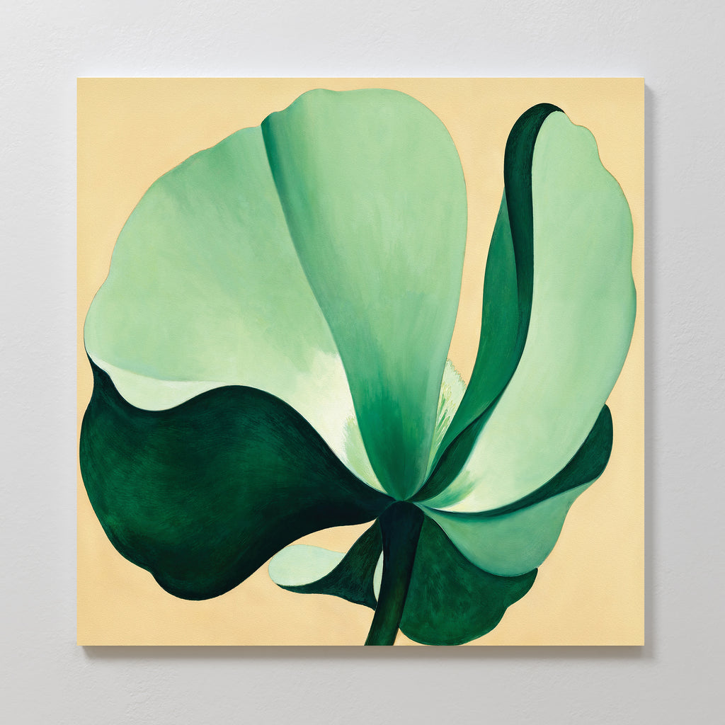 The Tropical Serenity Canvas Art - Square features a large, abstract green flower with broad curved petals on a light beige background, blending modern green hues for a soft, organic touch—ideal as coastal wall decor.