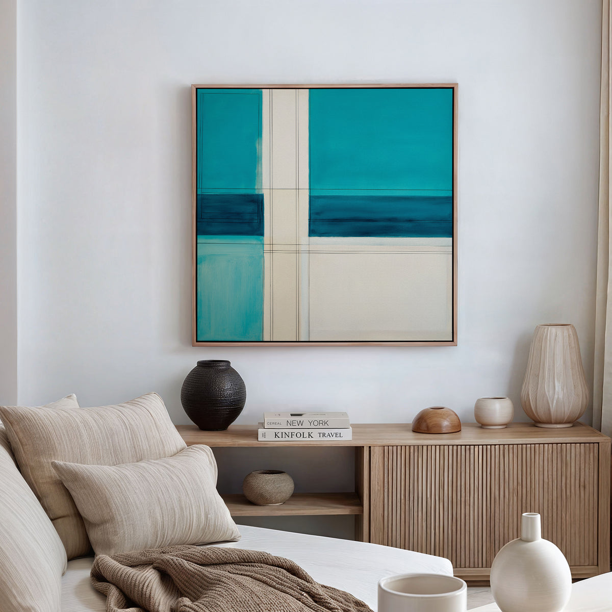 A modern living room with a beige sofa, neutral cushions, a wooden sideboard holding vases and books, and the Turquoise Grid Canvas Art - Square as striking modern wall decor above.