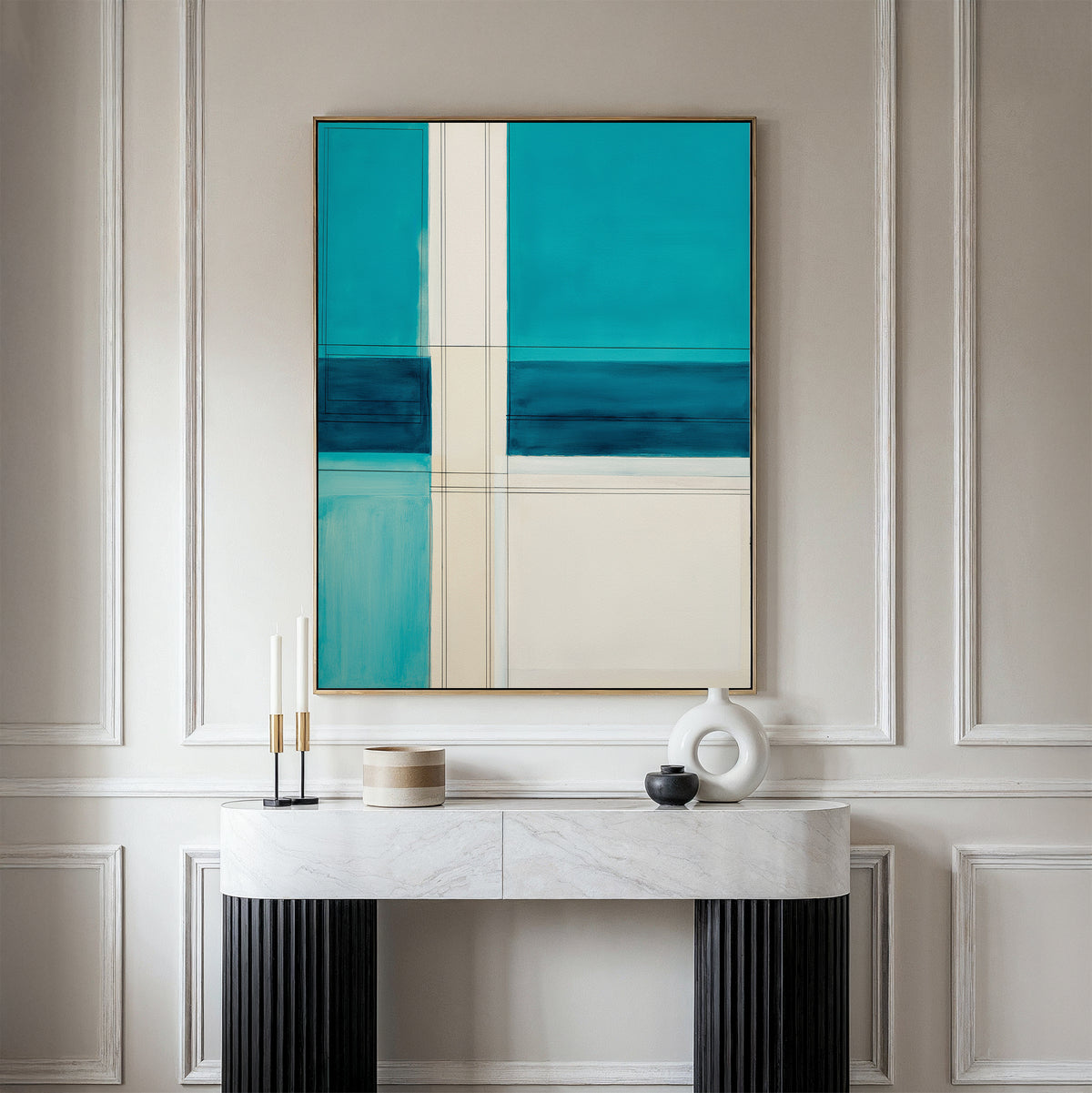 A modern console table with a marble top displays minimalist decor, including candles and ceramic vases, beneath the Turquoise Grid Canvas Art - Vertical, set against a white paneled wall.