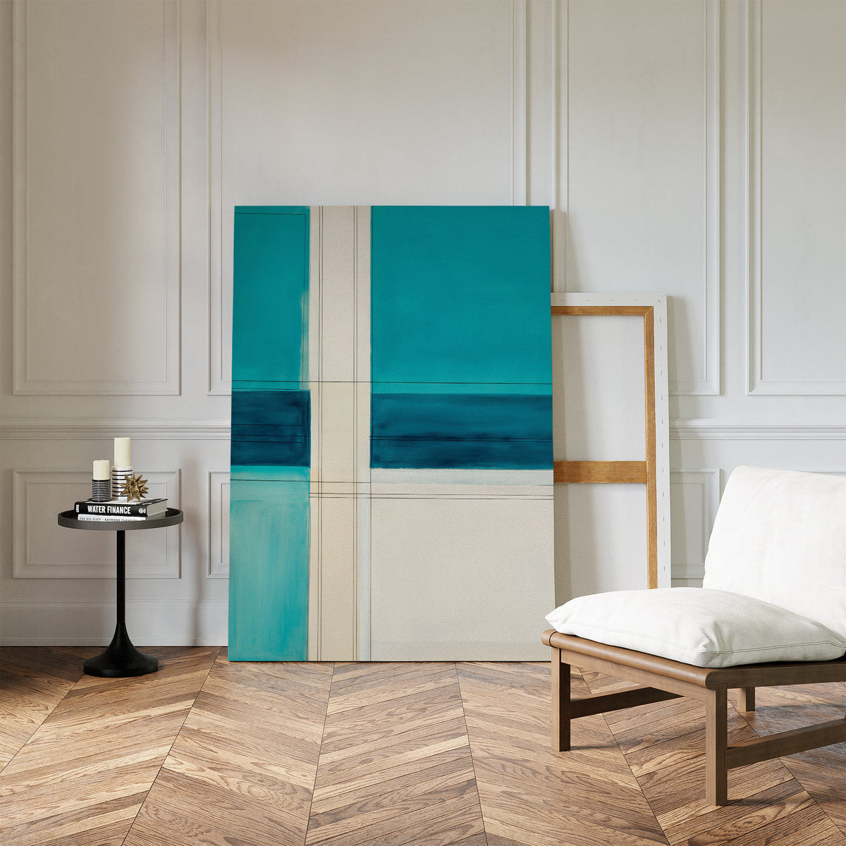 A modern room with herringbone wood floors, a white cushioned chair, and a round table with candles features the Turquoise Grid Canvas Art - Vertical resting against a white paneled wall.