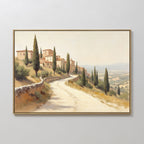 The Tuscan Village Canvas Art - Horizontal features a sunlit Mediterranean scene with cypress-lined winding roads, tan buildings with red roofs, and rolling hills—perfect rustic wall art for any space.