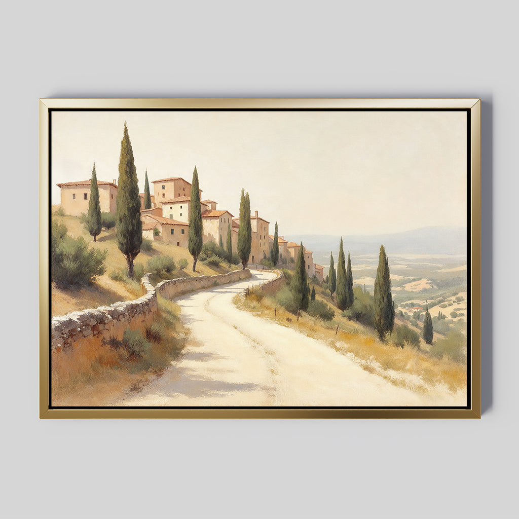 The Tuscan Village Canvas Art - Horizontal features a winding country road with cypress trees leading to a hilltop village, overlooking a scenic valley beneath a hazy Mediterranean sky. Framed and ready to enhance any space.