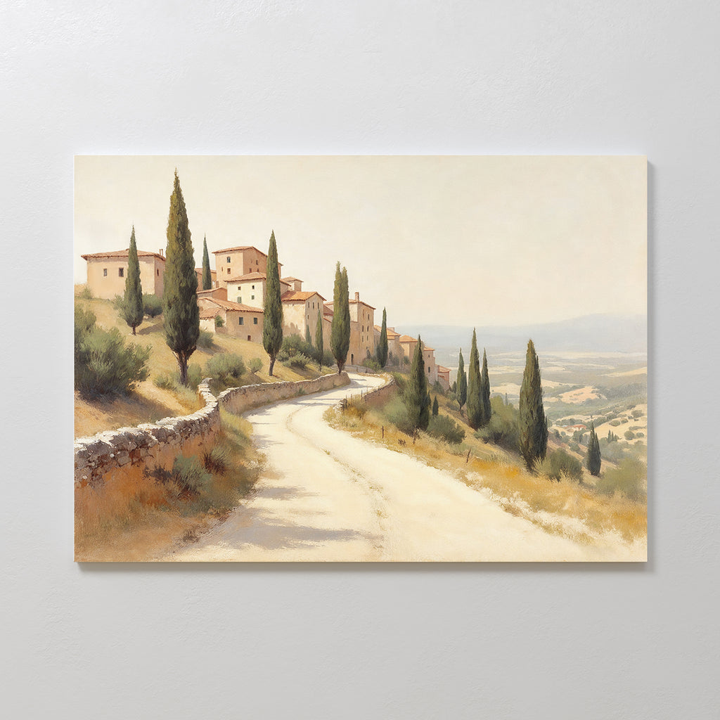 Tuscan Village Canvas Art - Horizontal features a winding country road with tall cypress trees leading to a hillside Tuscan village, ideal as rustic wall art or a Mediterranean canvas print with rolling hills and a pale sky.