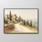 The Tuscan Village Canvas Art - Horizontal showcases a winding country road lined with cypress trees, leading to a hillside village under rolling hills and a soft, hazy Mediterranean sky.