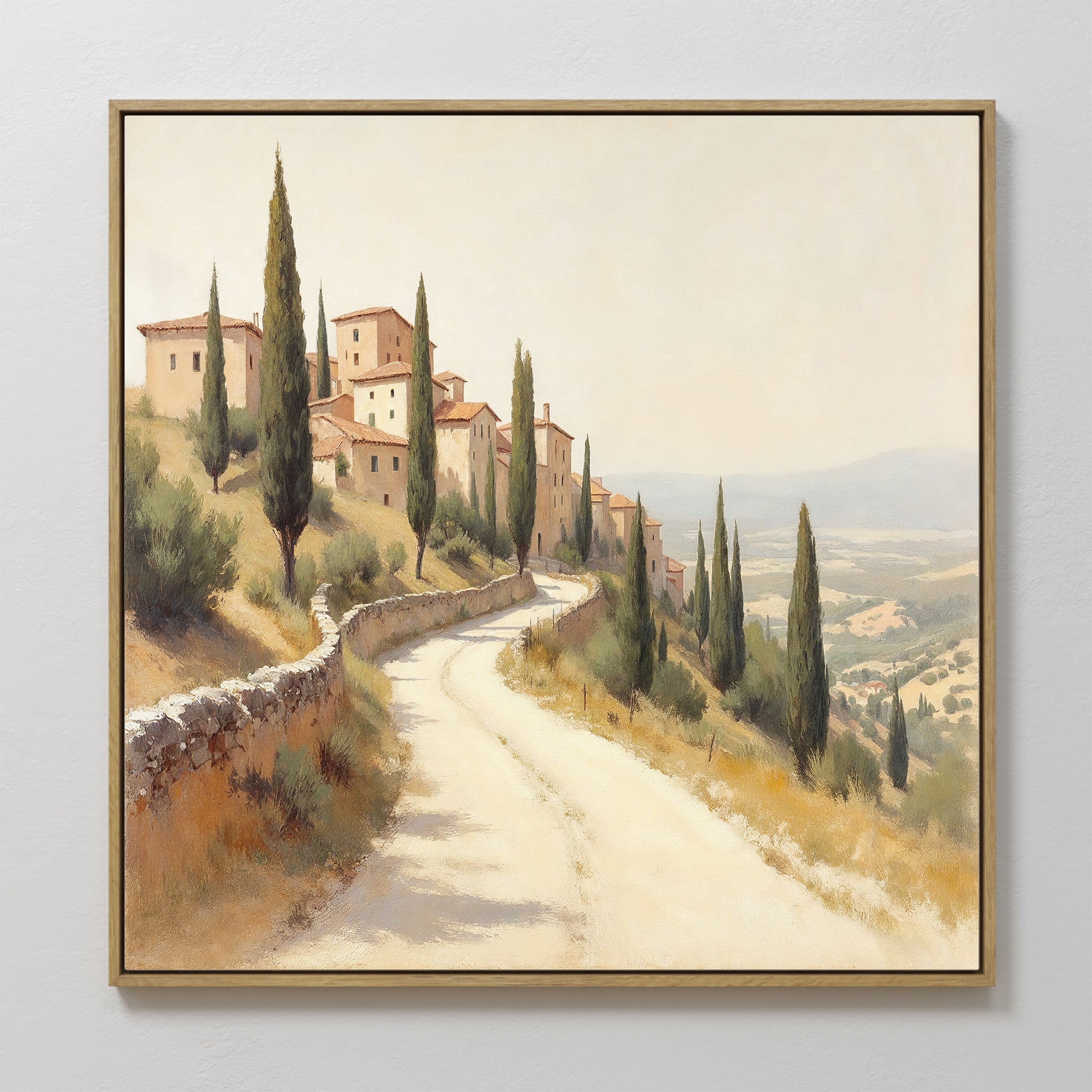 The Tuscan Village Canvas Art - Square features a winding country road lined with cypress trees leading to a hillside village—perfect rustic wall art for brightening your space.
