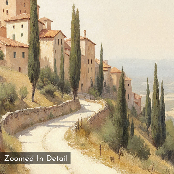 The Tuscan Village Canvas Art - Square depicts a winding road bordered by cypress trees, curving past rustic tan hillside buildings with distant mountains, while "Zoomed In Detail" appears in the corner of this charming wall art.