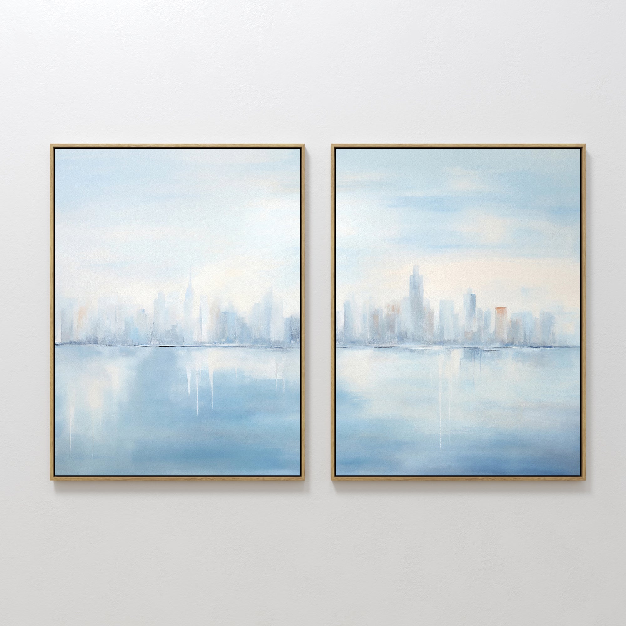 Urban Mirage - Set of 2 features square canvas prints with a soft, abstract city skyline reflected over water in pale blue, white, and peach—ideal wall art for modern living room décor.