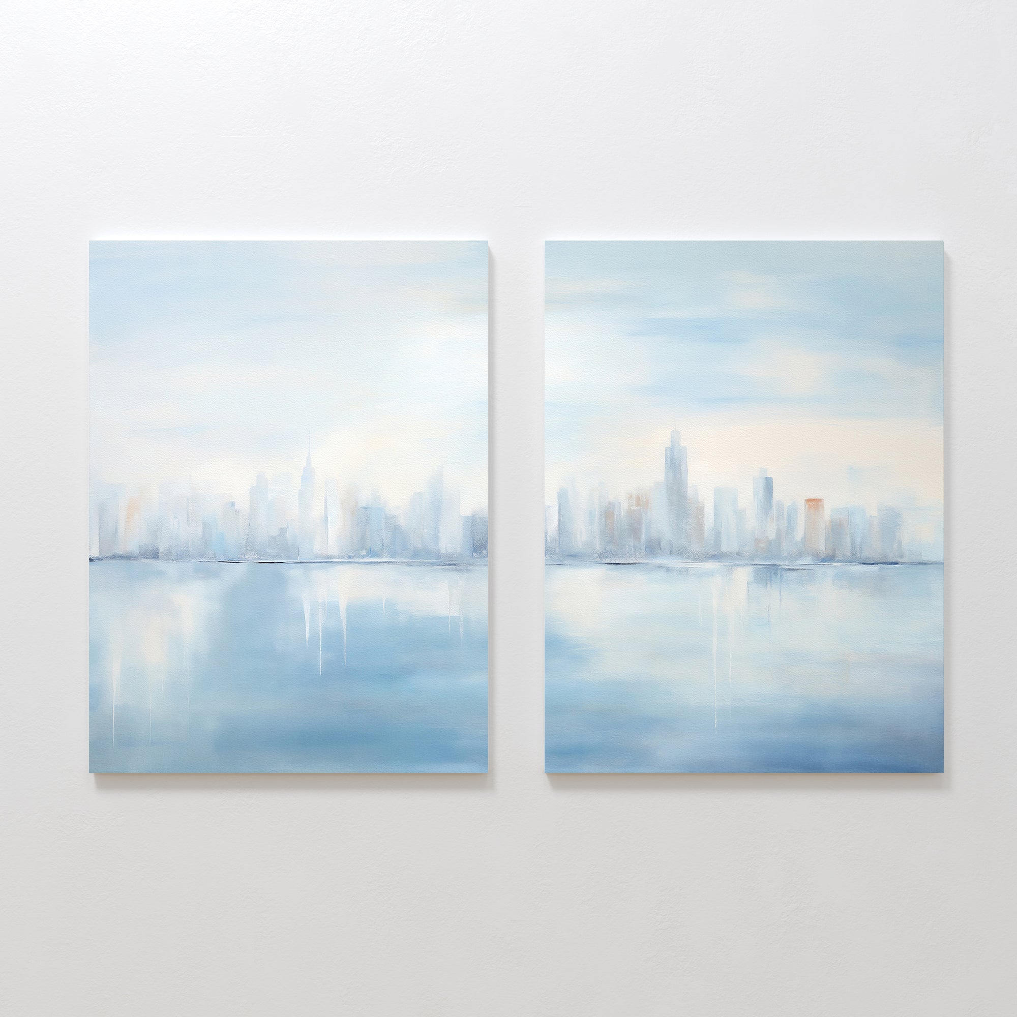 The Urban Mirage - Set of 2 features side-by-side canvas prints of an abstract city skyline reflected on calm water, with pale blue and warm tones adding a dreamy, tranquil vibe to your modern living room decor.