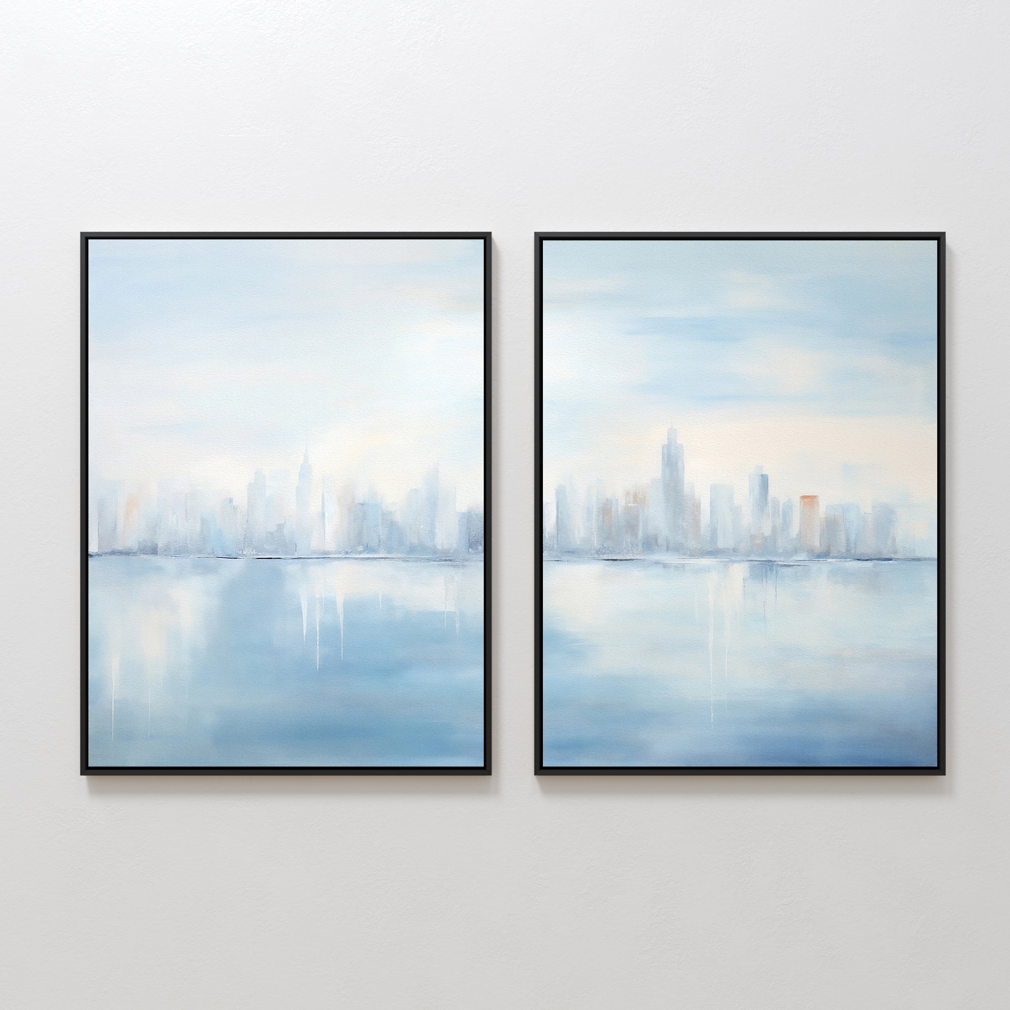 The Urban Mirage - Set of 2 features framed canvas prints of a blurred blue and white city skyline with water reflections, displayed side by side—an ideal modern accent for your living room wall.