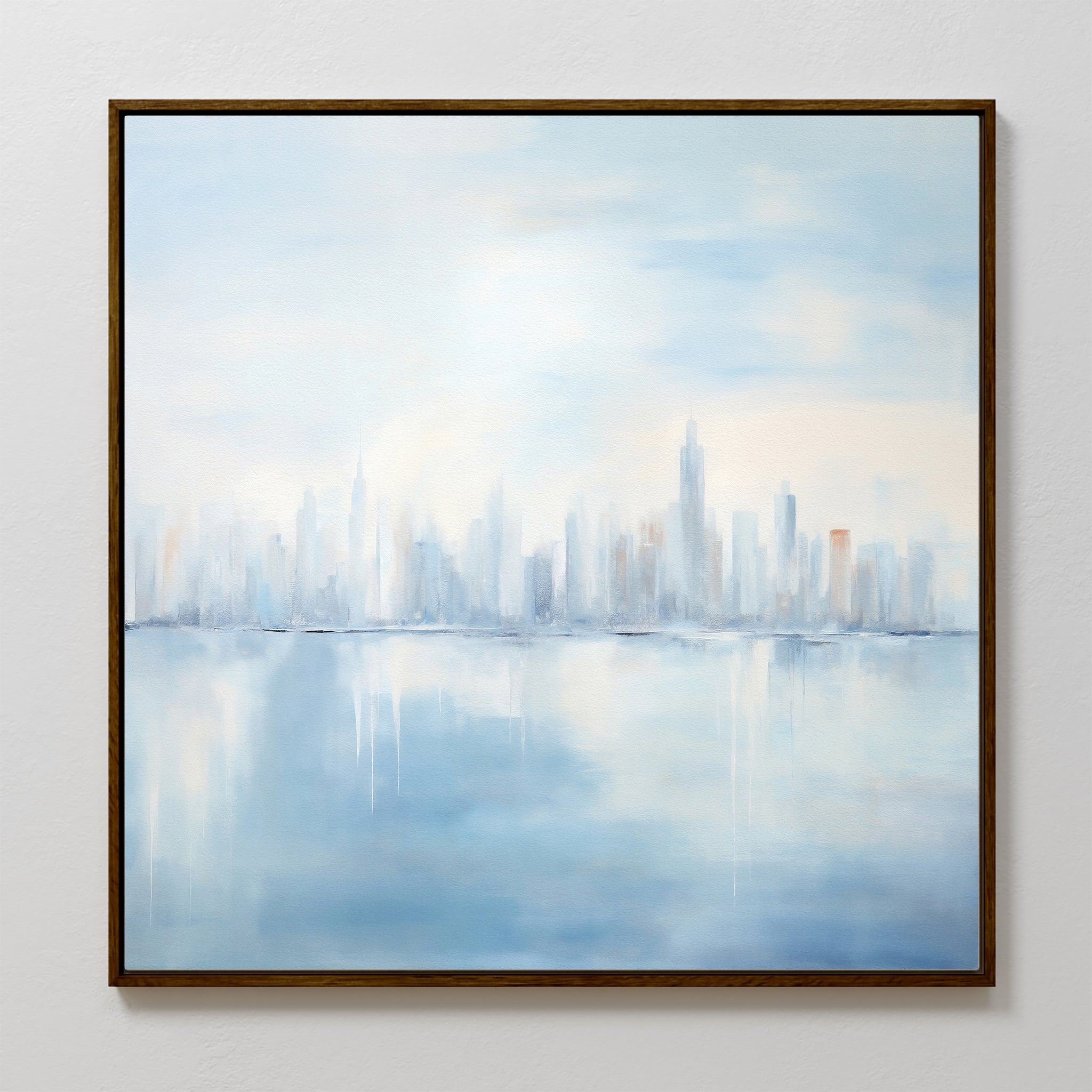Urban Mirage Canvas Art - Square: A dreamy city skyline in soft blue and white, with tall buildings reflected on calm water. Perfect modern wall decor for a serene, blurred ambiance in your living room. Framed and ready to hang.
