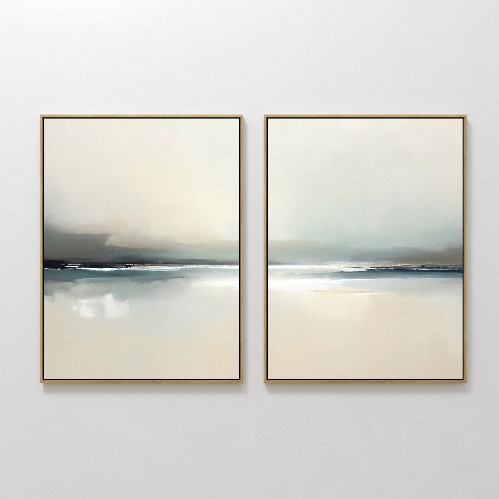 The Veiled Estuary - Set Of 2 features framed abstract landscape prints in soft beige, gray, and blue tones, adding a serene Nordic Park-inspired touch to your wall with contemporary art depicting a calm water horizon.
